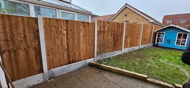 New fencing around a Bromsgrove back garden with a summerhouse