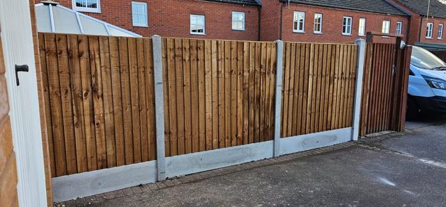 New closeboard fencing and gate beside a driveway in Bromsgrove