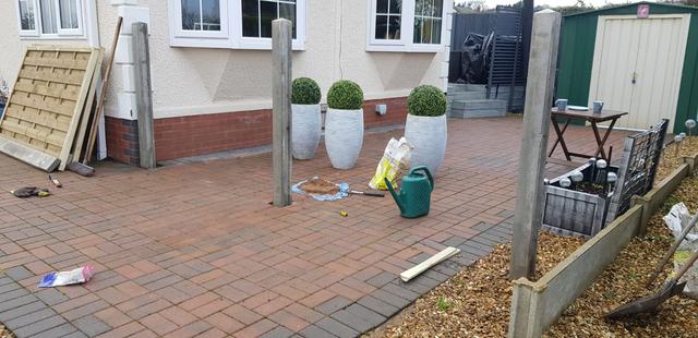 Garden fence panels around a patio in Droitwich
