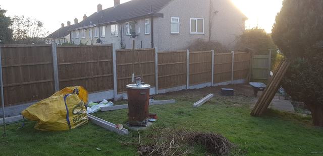 Closeboard fencing being fitted in a Harborne garden