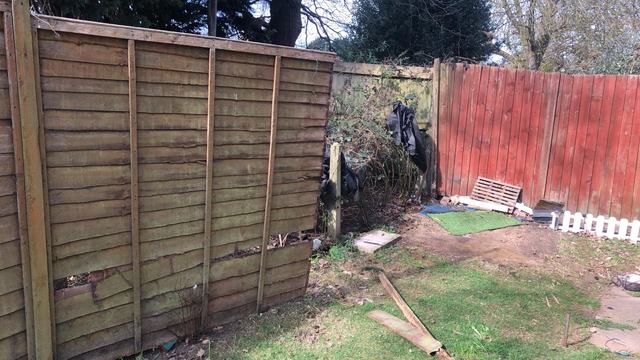 Lap panel fence along a Kings Norton back garden