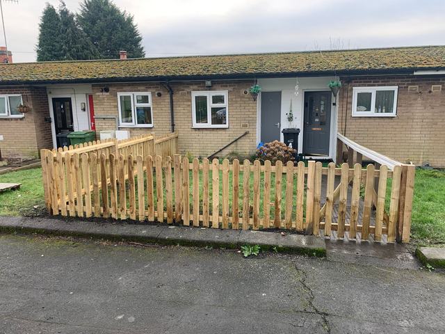 Timber picket fencing fitted along the front of a Dudley bungalow