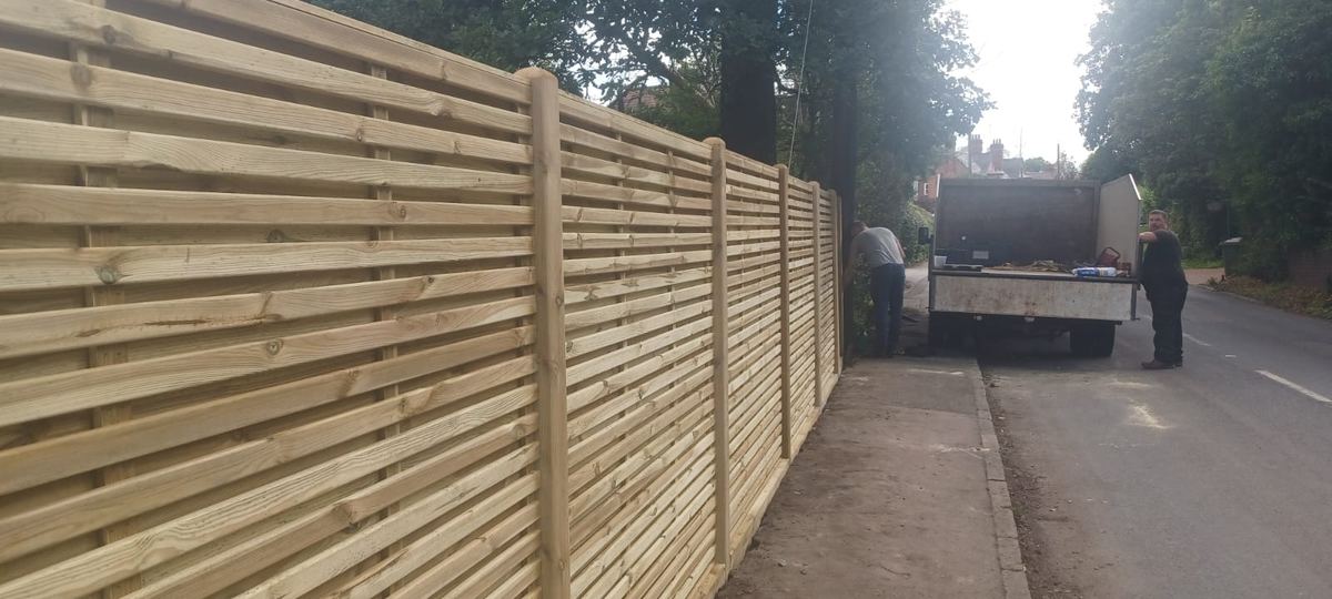 Horizontal slatted timber fencing in Redditch, photo 1