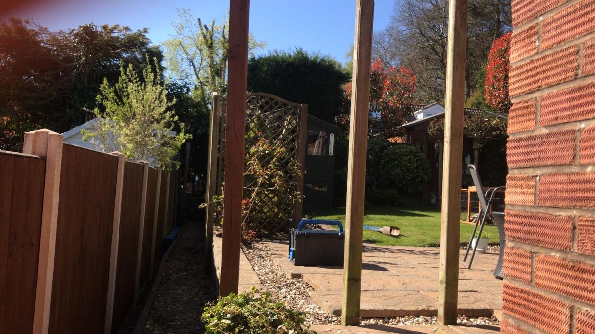 Dark brown fence with a trellis-topped panel in Stourbridge, photo 4