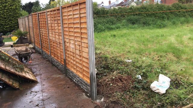 Lap panel fencing along a long boundary in Stourport-on-Severn